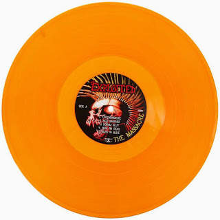 The Massacre by The Exploited on orange vinyl