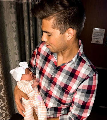 Trace Bates with newborn Willow Balka 