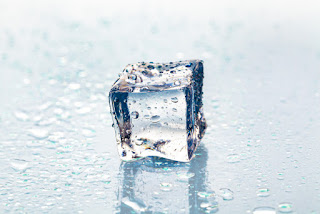 https://image.freepik.com/free-photo/melting-ice-cube-wet-table_93675-82605.jpg