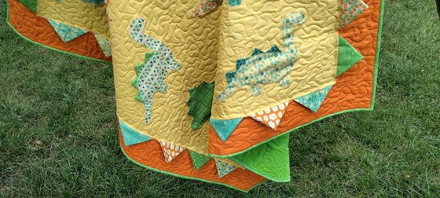 Dinosaur quilt by Slice of Pi Quilts