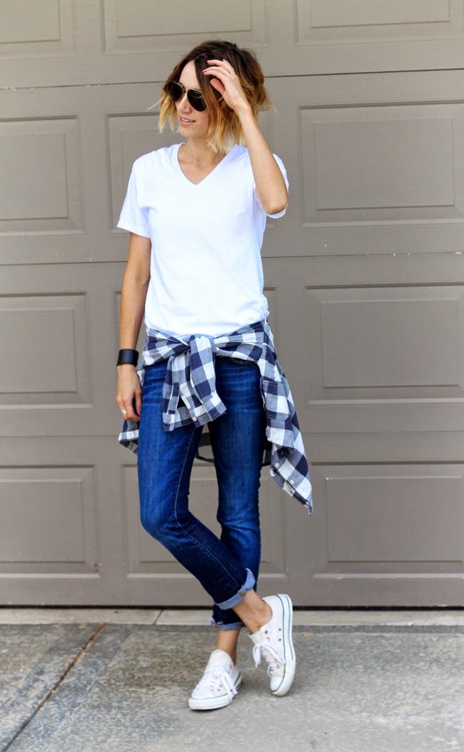 White vneck, dark denim & a plaid shirt tied around the waist style