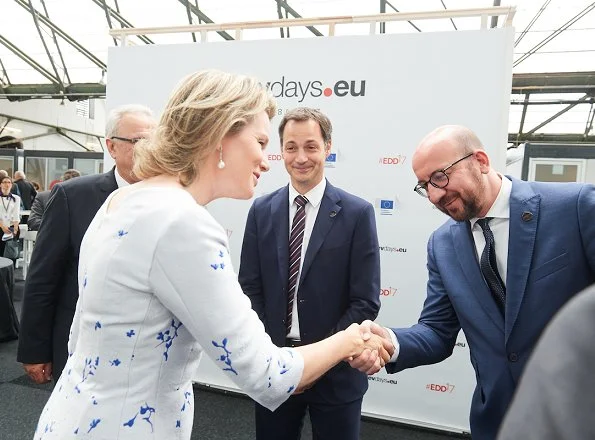 Queen Mathilde attended the opening ceremony of European Development Days at Tour et Taxi and held a lunch at Laken Royal Palace. Queen wore Natan Dress, Clutc and Pumps 