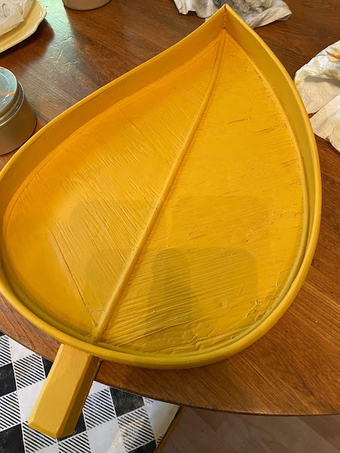 Photo of leaf shaped tray painted in Colonel Mustard.