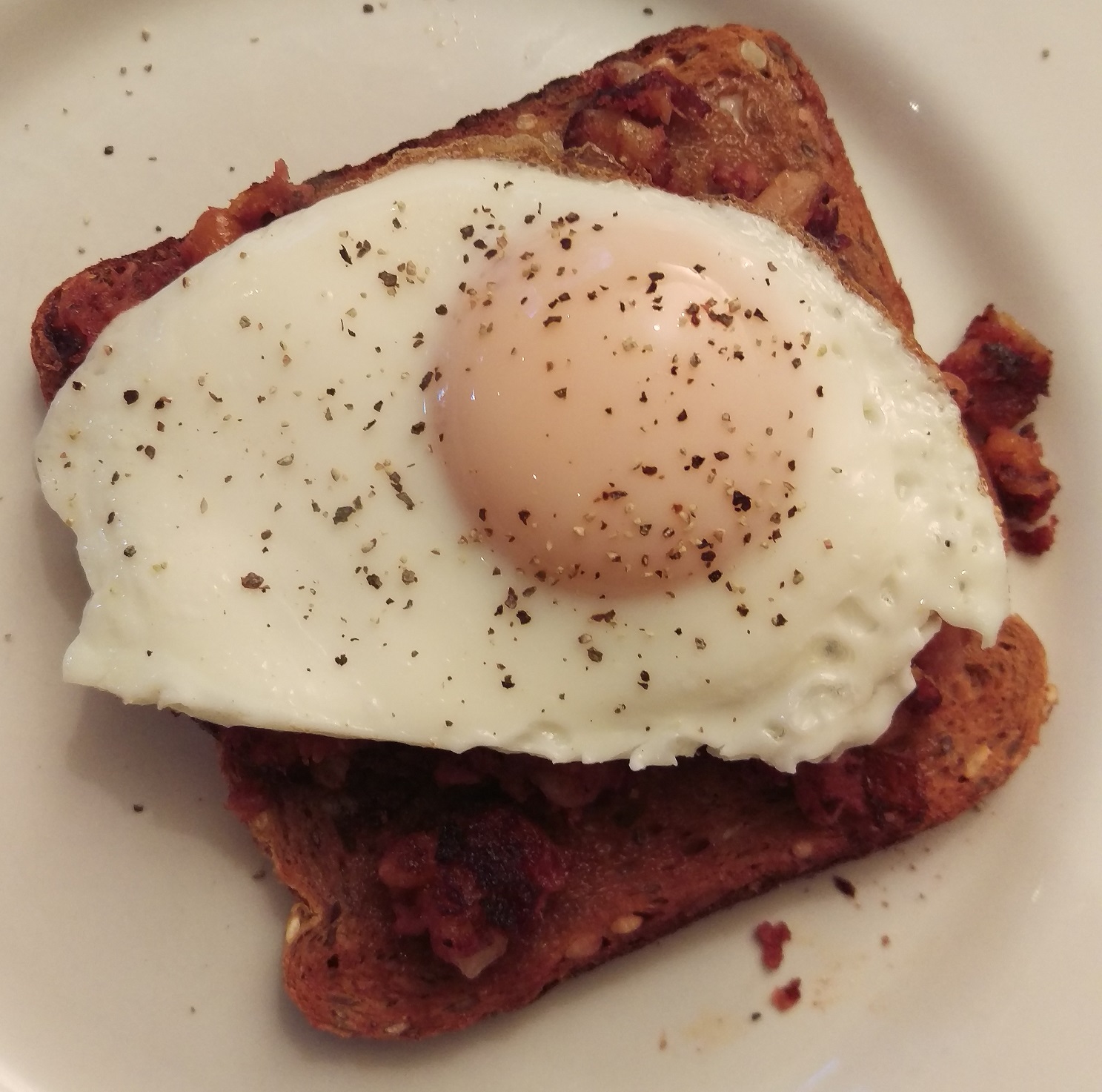 Jules' Dinner Table Corned Beef Hash on Toast with A Fried Egg
