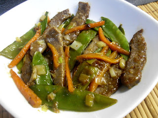 Ternera con tirabeques y zanahoria en salsa de ostras