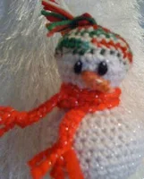 http://www.ravelry.com/patterns/library/shivers-the-snowman-ornament