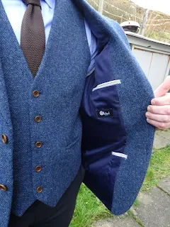 inside pocket of tweed jacket silk lined 