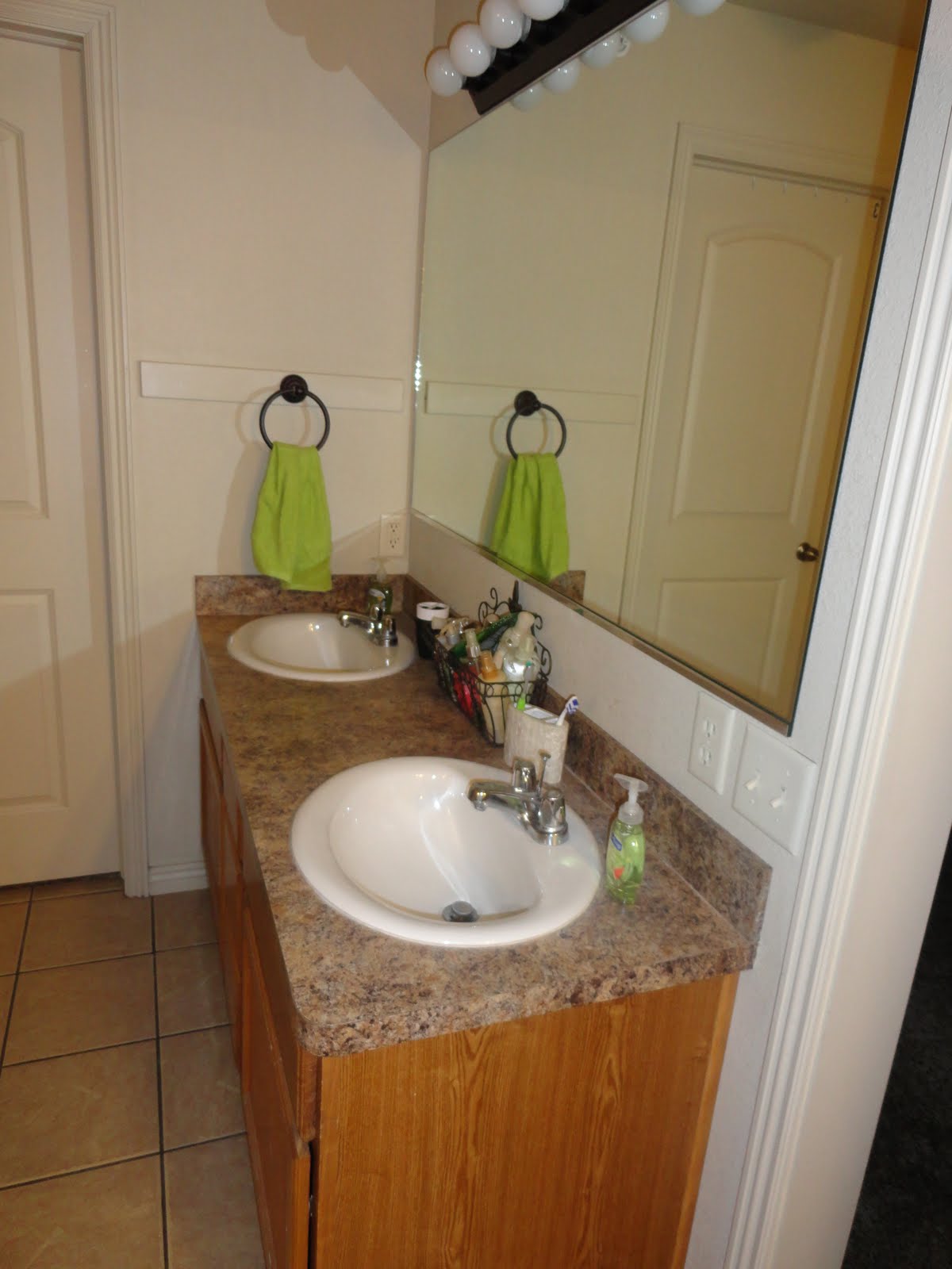 and two sinks, mirrors, and cabinets like this. title=