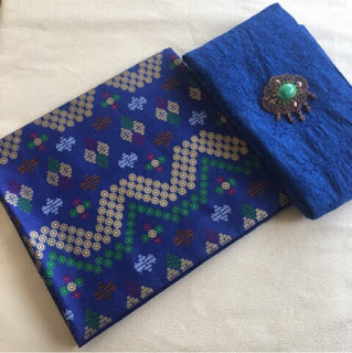 Kain Batik dan Embos 141 b