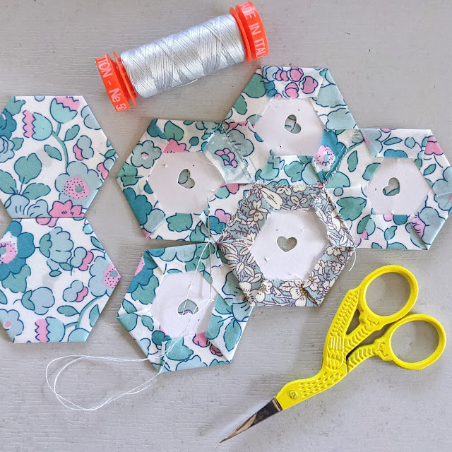 epp hexies stitched together from the back, embroidery scissors