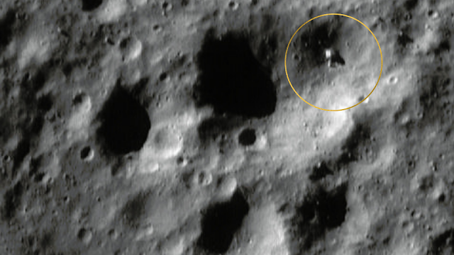Look at the size of this boulder on Asteroid Eros.