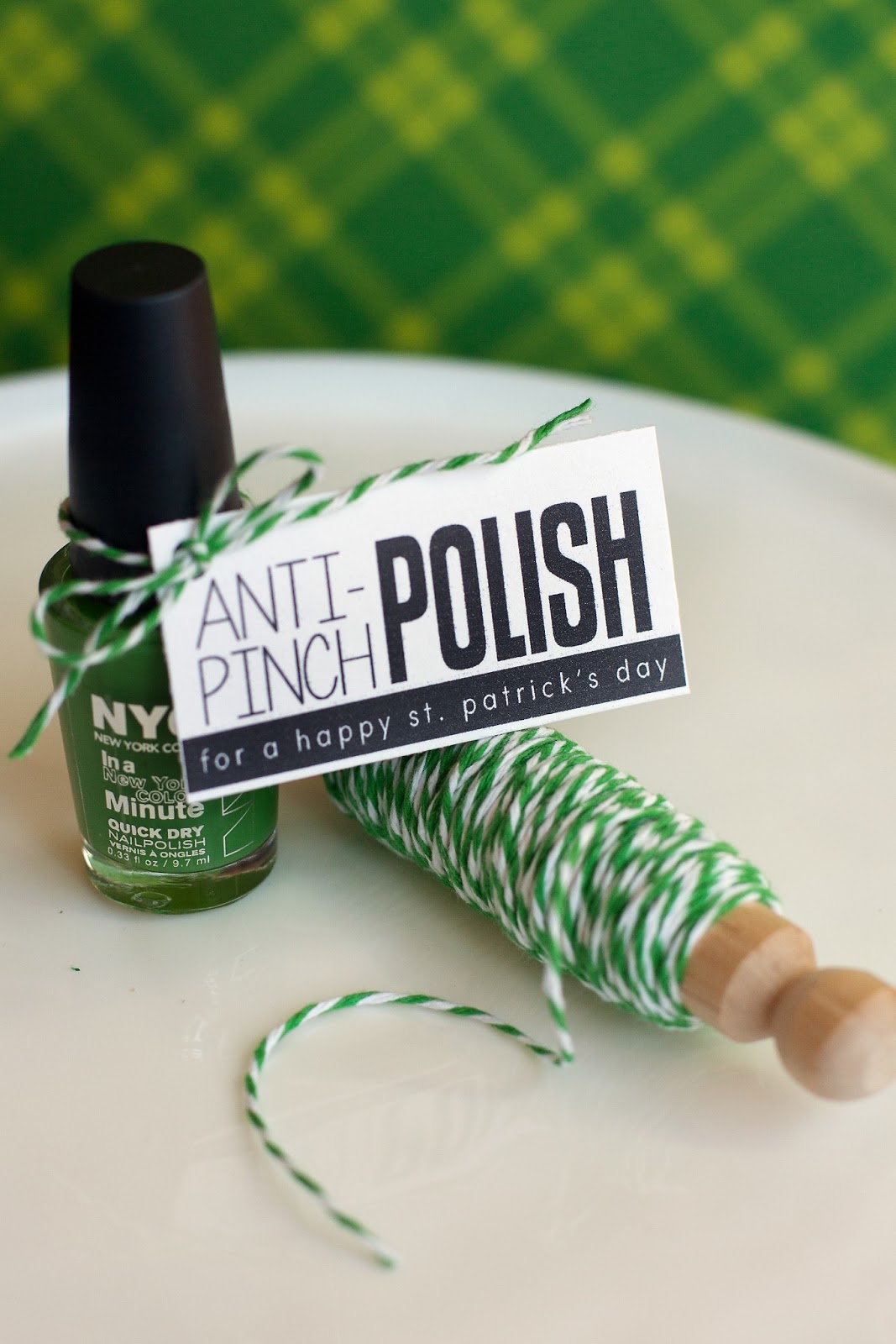 green nail polish and a anti pinch St. Patrick's tag