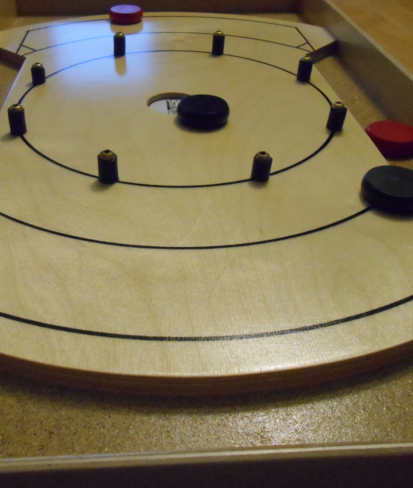 CrokinoleCentre Crokinole is over 140 years old, but it has never