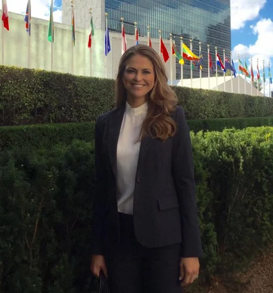 Princess Madeleine attended the seminar of World Childhood Foundation in New York. Madeleine wore bespoke woman pantsuit fashions, style