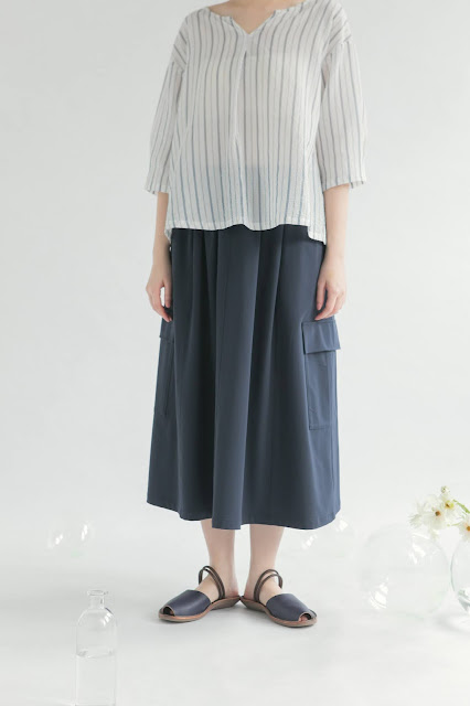 深藍色彈力大口袋過膝裙