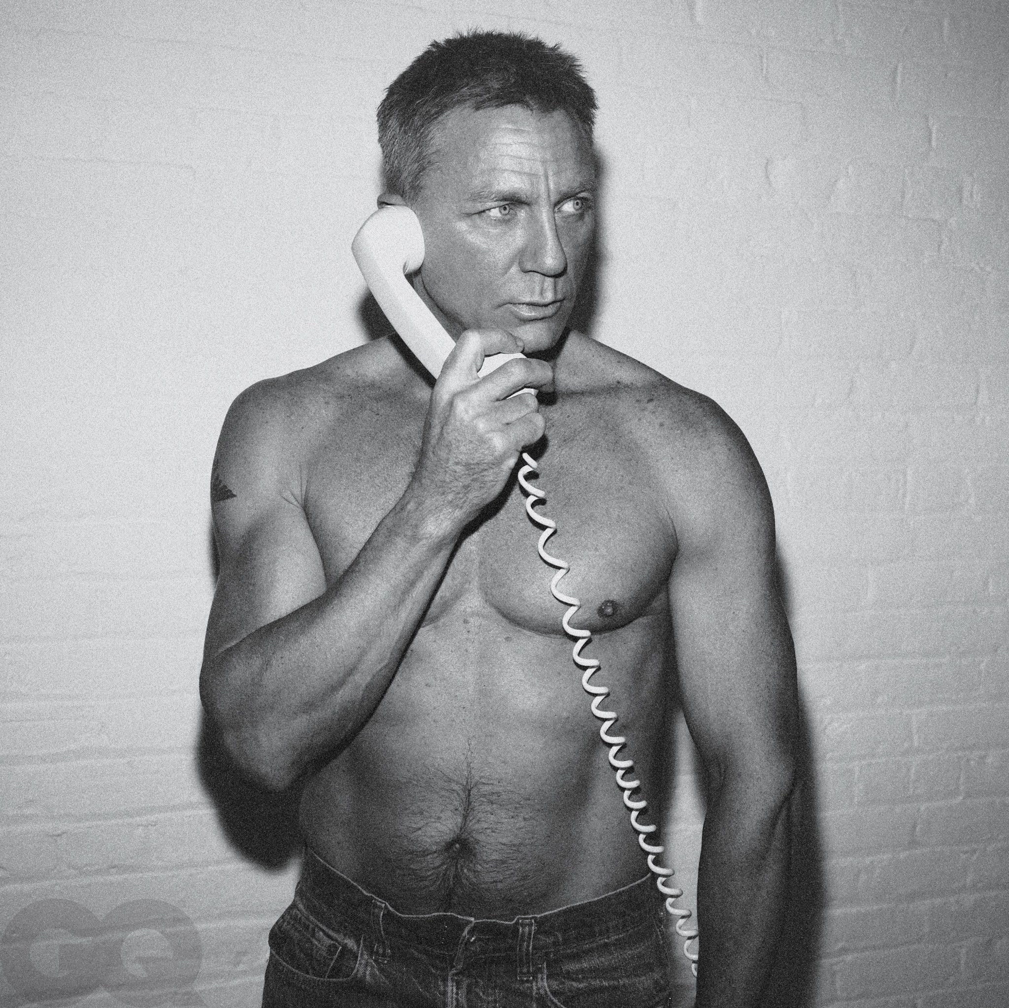 Daniel Craig, poses shirtless in GQ ahead of final James Bond film