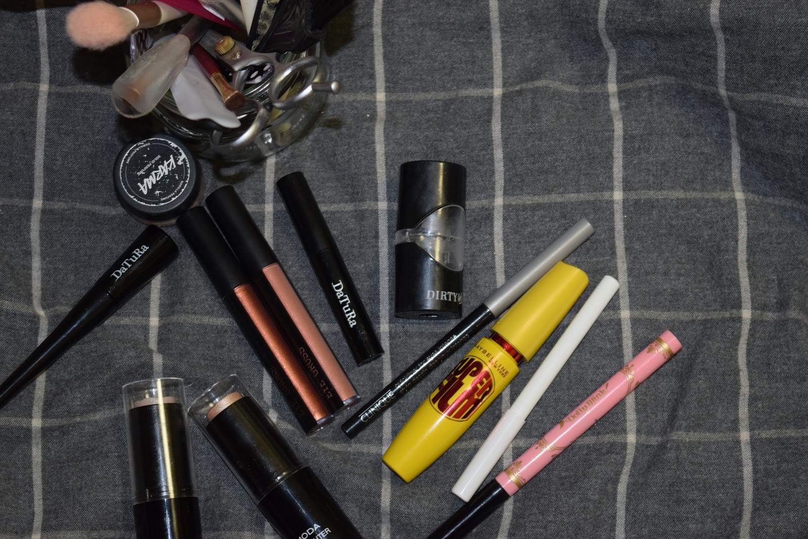 collection of makeup products flatlay