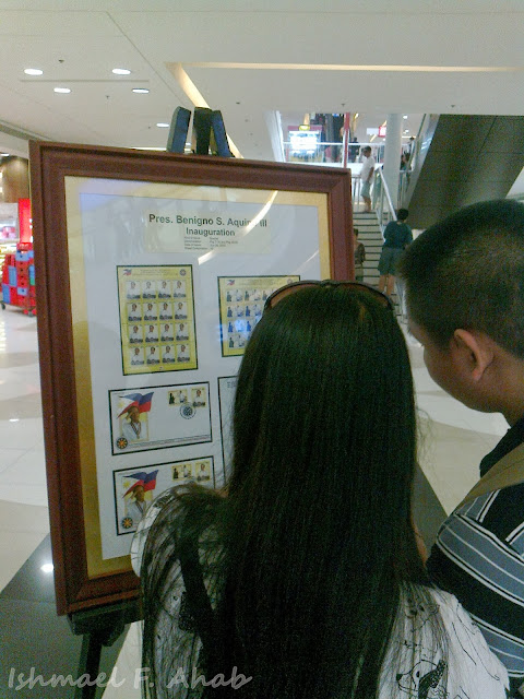 Couple looking at the PhilPost Sulat Mulat exhibit