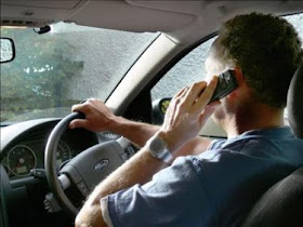 man on smartphone while driving