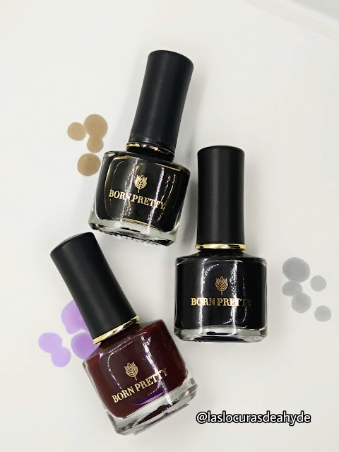 · esmaltes de las marca BornPretty efecto acuarela en colores lila, marron y negro.