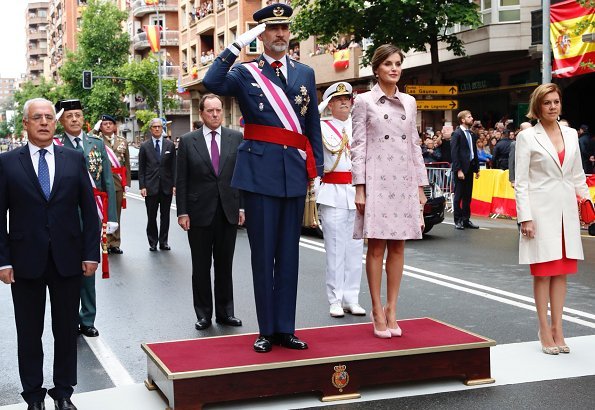 Queen Letizia wore Carolina Herrera Coat and Queen Letizia Jewels Coolook Sarin Earrings, she wore Magrit pups and carried clutch at Armed Forces Day