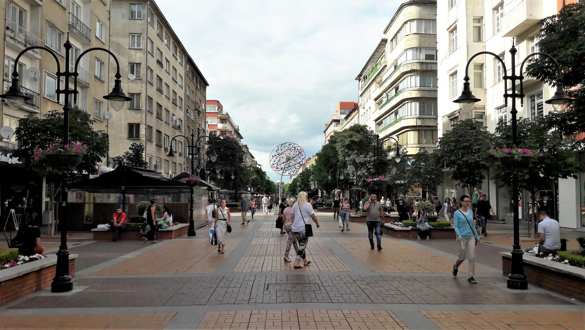 View of the pedestrian road Vitosha Boulevard full of people walking and shopping