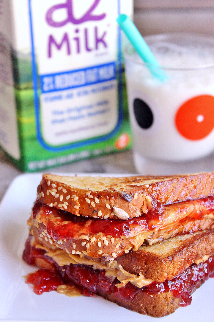 a2 Milk® helps those with self diagnosed post dairy digestive discomfort enjoy real milk again. Pair it with our favorite back to school snack, the grilled peanut butter and jelly sandwich! #a2milk #IC (AD)