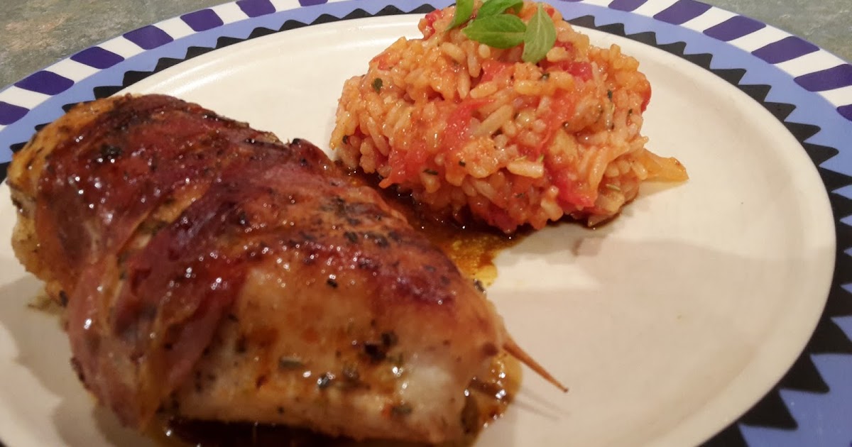 Hähnchenbrust gefüllt mit getrockneten Tomaten und Feta zu Tomatenreis Hähnchenbrust gefüllt mit getrockneten Tomaten und Feta zu Tomatenreis