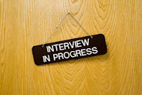 Interview in Progress sign