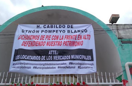Comerciantes de mercados de Chetumal cuelgan mantas y advierten a Otoniel que defenderán su patrimonio