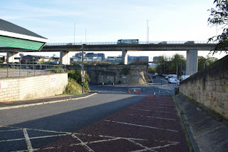 Traffic passing the arena on the Reheugh bridge