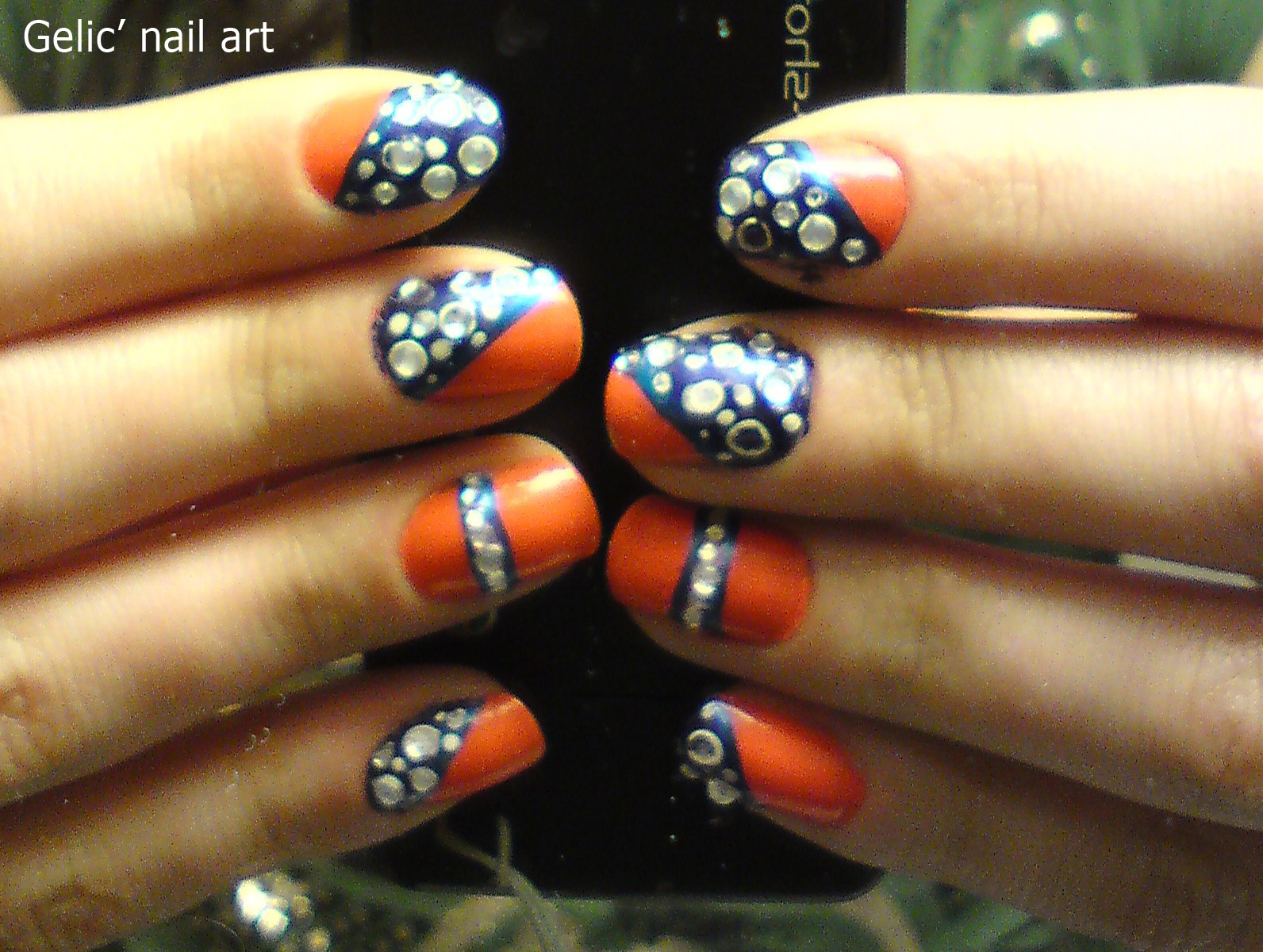 orange and blue nail art design