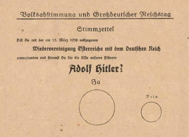 Бланк плебисцита 10 апреля 1938: «Согласен ли ты с произошедшим 13 марта 1938 г. воссоединением Австрии с Германией и голосуешь ли за список нашего лидера Адольфа Гитлера?», над большим кругом надпись «Да», над маленьким – «Нет».