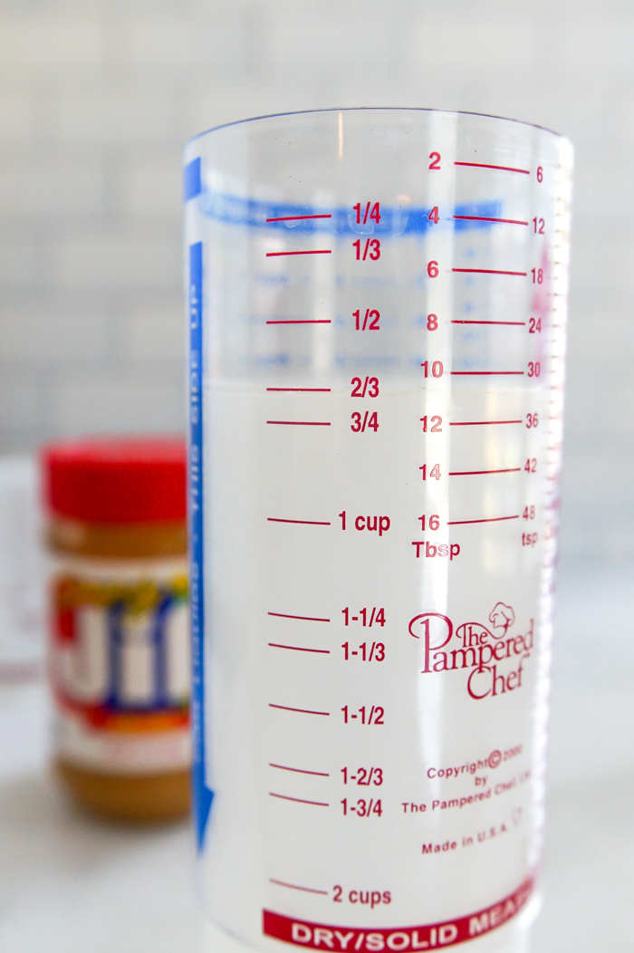 Essentials for Bakers: Adjustable Plunger-Style Measuring Cup