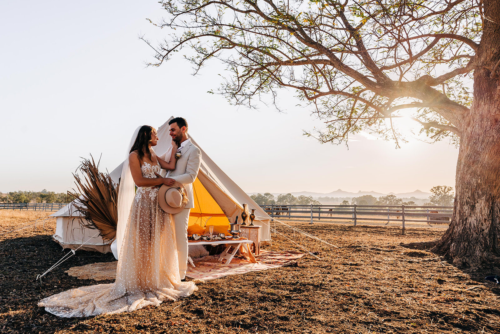 to the aisle australia | champagne at sunrise summer land camels shoot match made photography gold coast weddings country boho floral design cake stationery venue