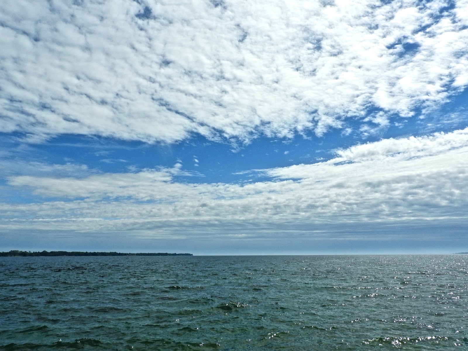 MerrySyracuse Beginning of the St. Lawrence River Between Wolfe Island, Ontario and Cape