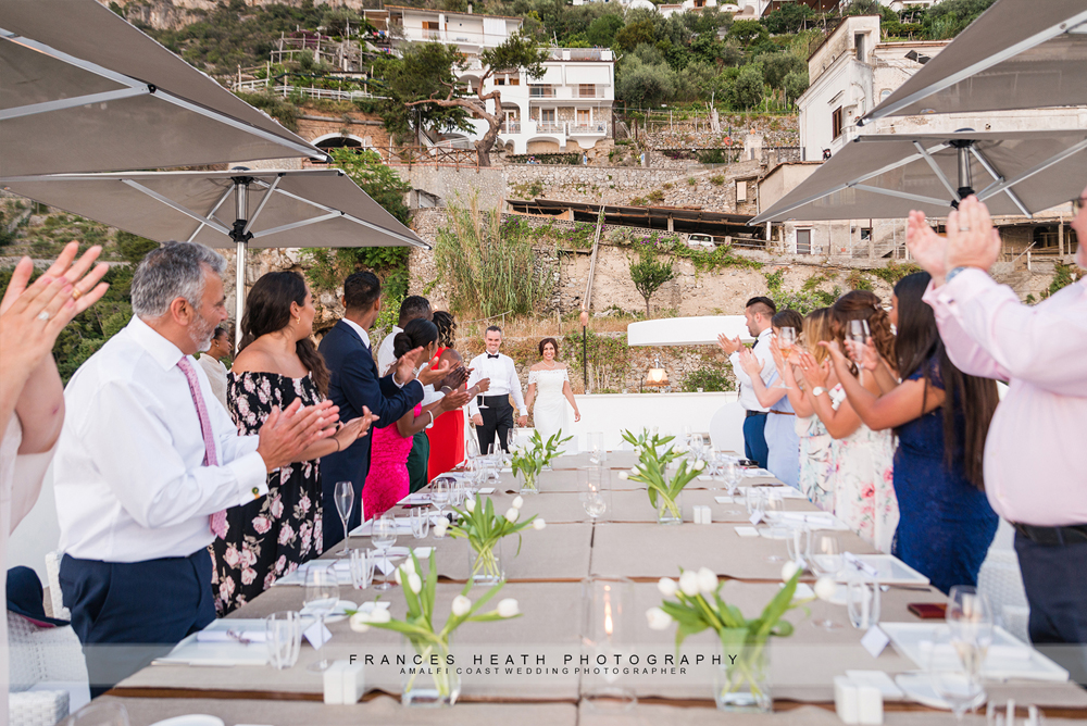 Bride and groom at wedding reception in Praiano