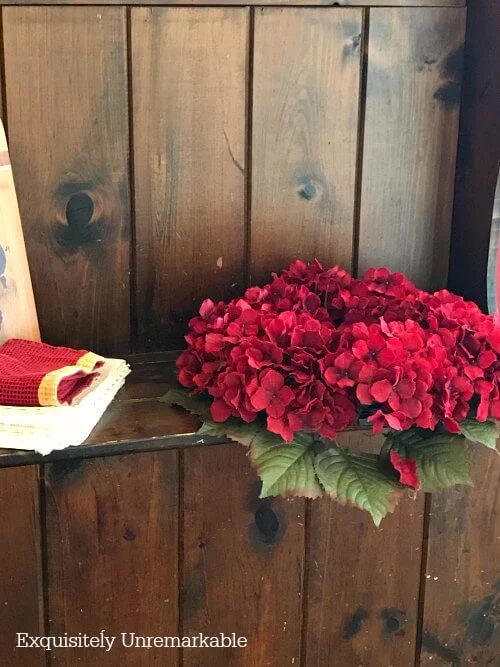 Red Country Wreath On a bench