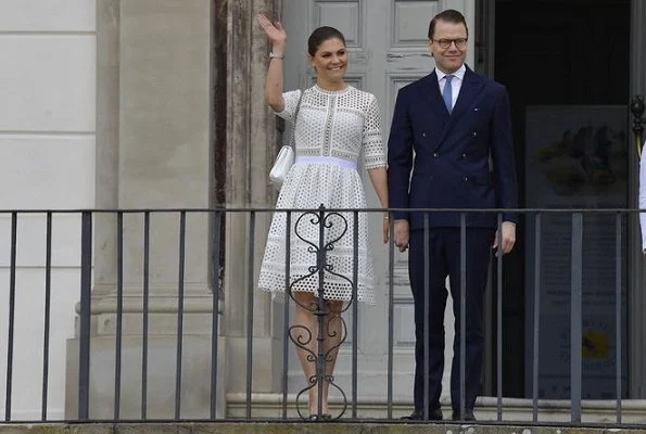 Crown-Princess Victoria wore By Malina Emily Midi Dress, Gianvito Rossi pumps and she carried Ralph Lauren Ricky chain bag, Sweden's National Day 2018