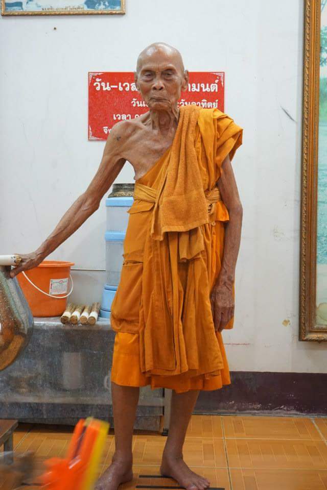 this buddhist monk standing smiling two months after this buddhist monk standing smiling two months after