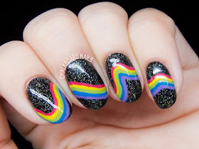 Galactic rainbow nails by @chalkboardnails