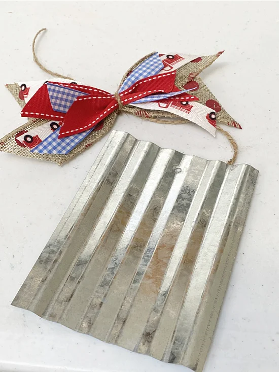 galvanized steel and red, white and blue bow