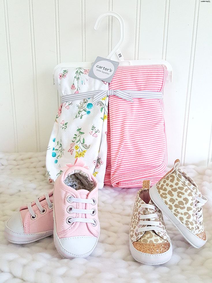 Being a parent has brought all kinds of joy into my life, but one thing I love the most about being a mom to a baby girl is all of the adorable fashions I get to style her in... Get the details on some of my favorite Newborn styles from Carter's, snag a coupon, and find out how you could win 1 of many $100 Gift Cards! #LoveCarters #BodySuitSweepstakes