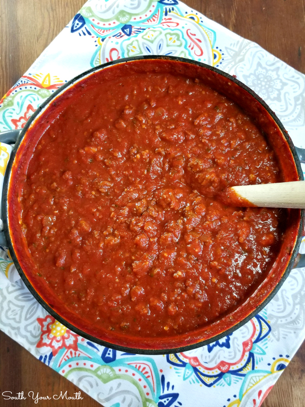 Homemade Spaghetti with Meat Sauce | A hearty classic Italian pasta sauce recipe made from scratch with sausage and ground beef. Easily cut this BIG BATCH recipe in half or make a whole pot for feeding a crowd or stocking your freezer with an easy weeknight meal.