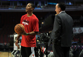 The Bulls' Derrick Rose and general manager Gar Forman before Monday's game against Charlotte at the United Center.(January 29, 2013)