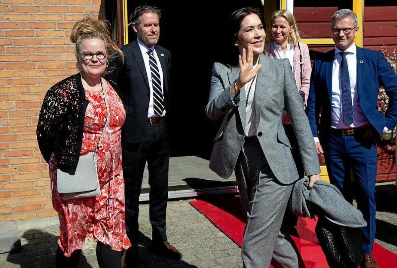 Crown Princess Mary wore a new checked wool-blend blazer, trousers suit from Alexander McQueen. Prince of Wales. Bottega Veneta