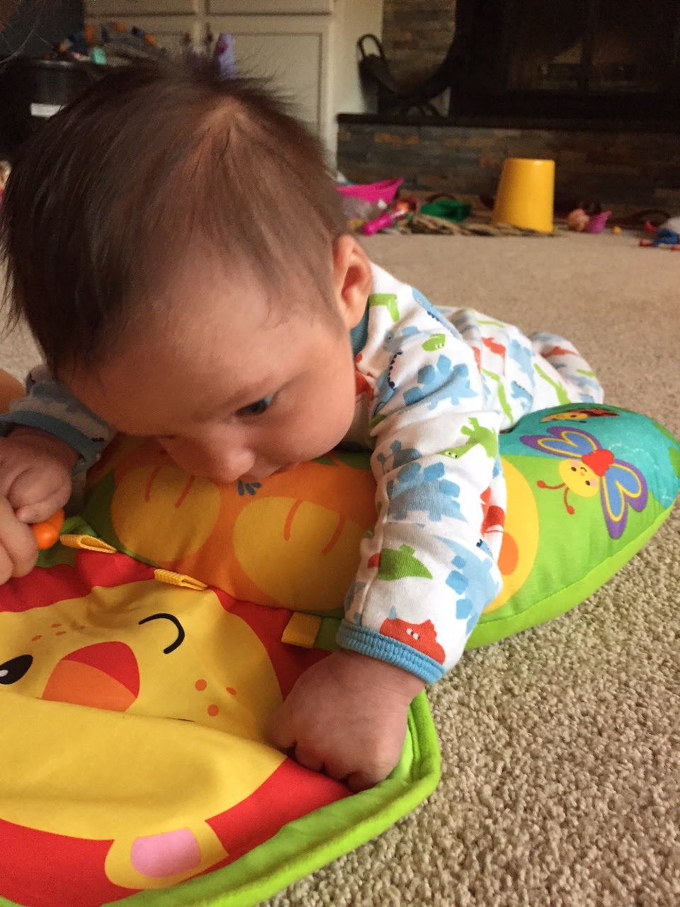 Life as a Spencer... Wes and grace testing out the new tummy time