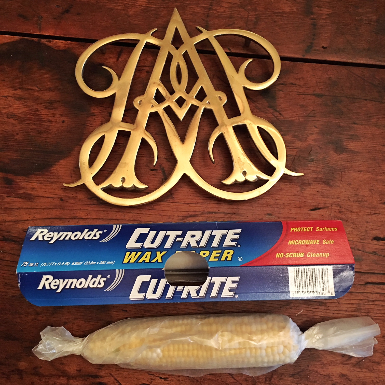 Content in a Cottage Cooking Corn on the Cob in Microwave