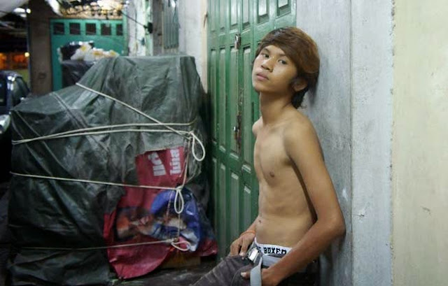 Street boy hustler in Bangkok