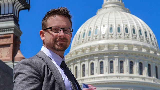 Michael Lambert stands in front of the Capital dome in Washington, DC